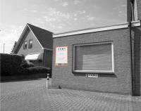 Reclames in woongebieden op bedrijfsbebouwing