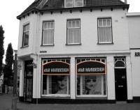 Reclames in winkelgebieden of op winkels en caf&eacute;'s e.d. in woongebieden