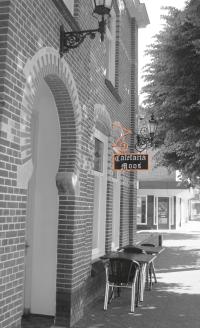 Bescheiden uithangbord in een traditionele vorm