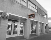 Maximaal 2 reclame-uitingen tegen de gevel