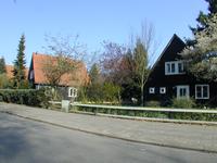 Houten huisjes langs de Deventerweg